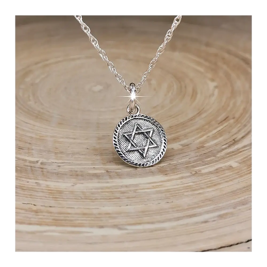 Colgante estrella de david en plata 950
