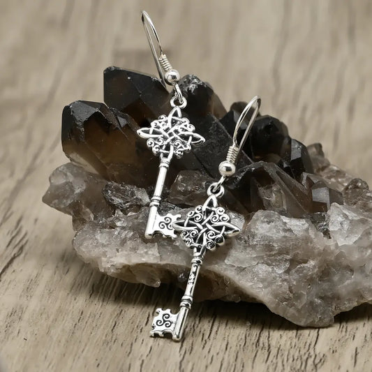 Aros, aritos llave nudo de brujas en plata 950