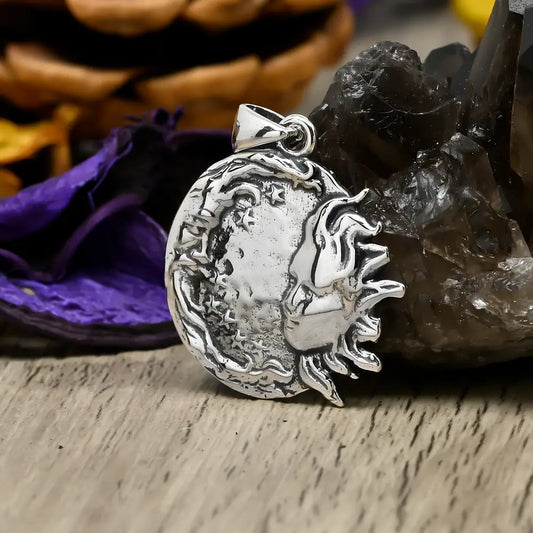 Colgante sol y luna en plata 950