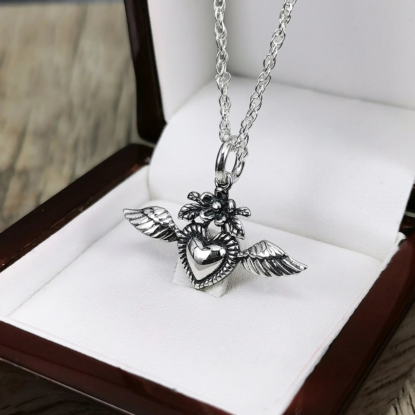 Colgante corazon detente en plata 950