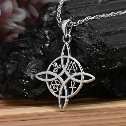 Colgante nudo de brujas con signos en plata 950